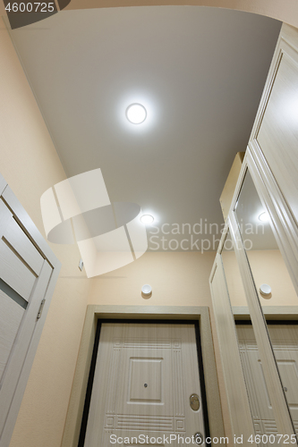 Image of View of the ceiling in a small hallway apartment