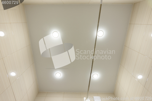 Image of Stretch ceiling in a small bathroom