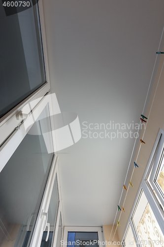 Image of White matte stretch ceiling on the balcony