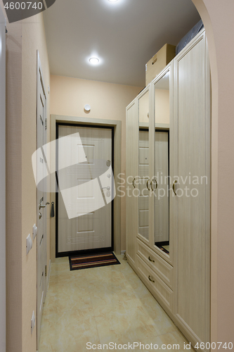 Image of View of the hallway in a small hotel room