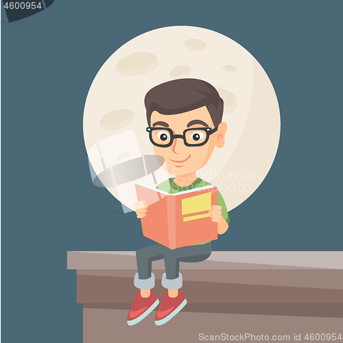 Image of Little boy reading a book on the roof of the house