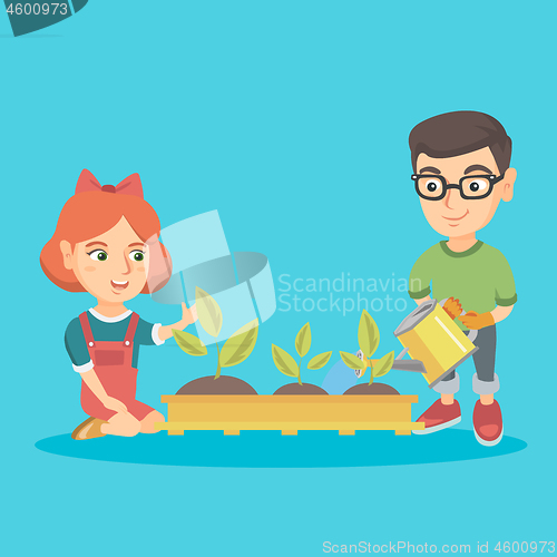Image of Caucasian boy and girl planting a sprout.