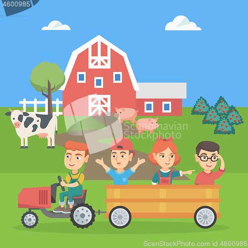 Image of Boy driving a tractor with his friends in trailer.