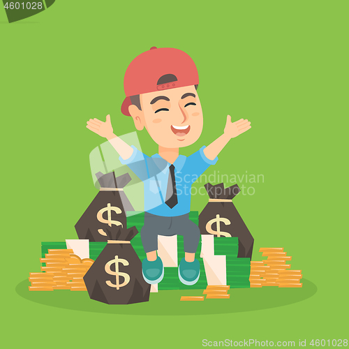 Image of Caucasian boy kid sitting among piles of money.