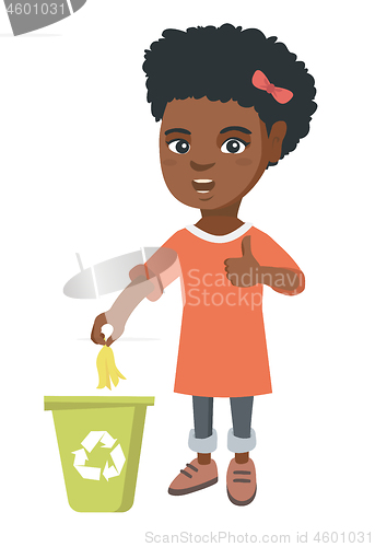 Image of Little girl throwing banana peel in recycling bin.