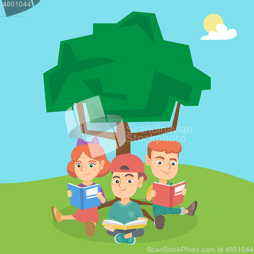 Image of School kids reading books under a tree on nature.