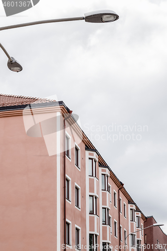 Image of Pink building and streetlight