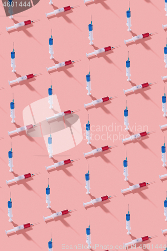 Image of Health pattern of disposable syringes with injectable drugs.