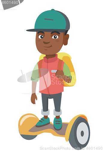 Image of African schoolboy riding on gyroboard to school.