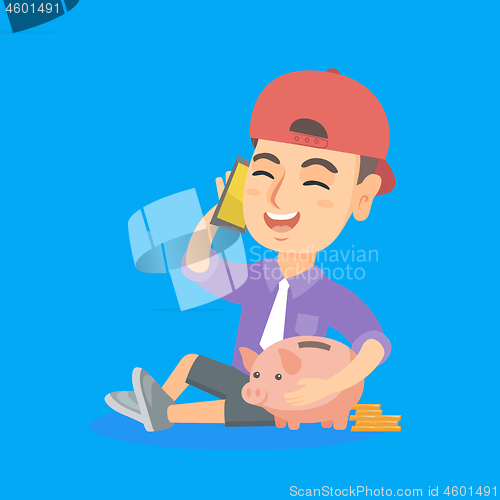 Image of Business boy with a piggy bank and a cellphone.