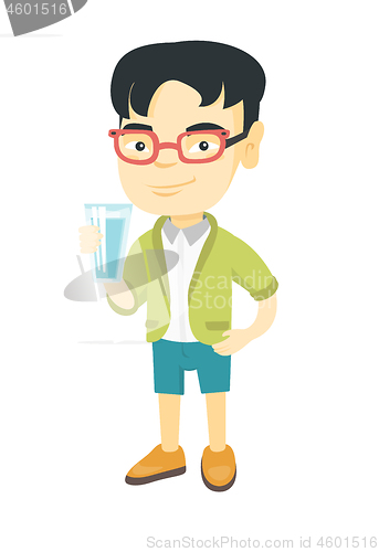Image of Little asian boy holding a glass of water.