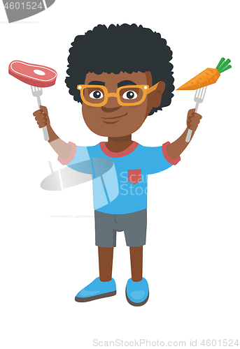 Image of Little african boy holding fresh carrot and steak.