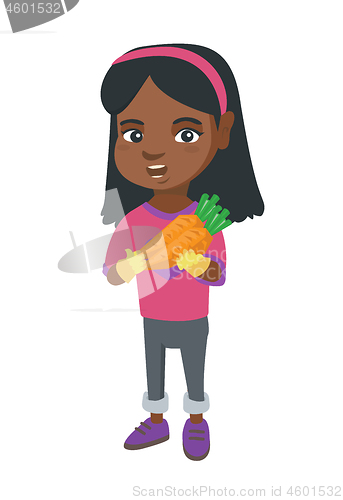 Image of African-american girl holding fresh carrot.