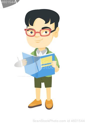 Image of Little asian schoolboy reading a book.