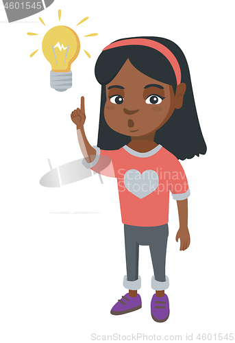 Image of African little girl pointing at the lightbulb.