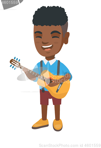 Image of African boy singing and playing acoustic guitar.