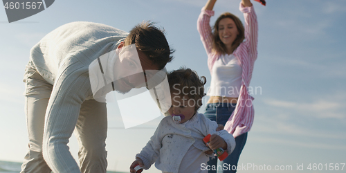 Image of Young family enjoying vecation during autumn