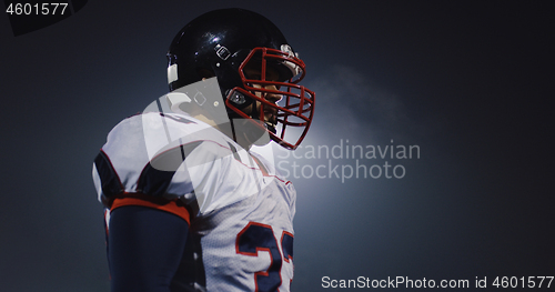 Image of portrait of young confident American football player
