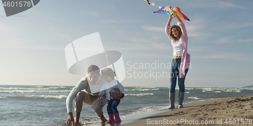 Image of Young family enjoying vecation during autumn