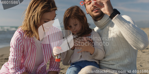 Image of Young family enjoying vecation during autumn