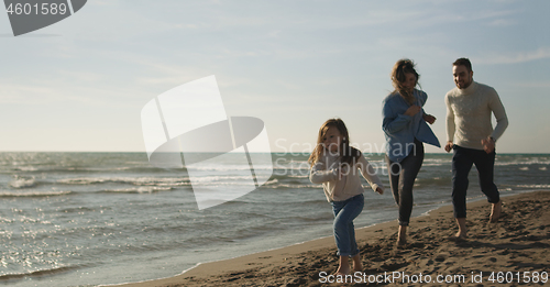 Image of Young family enjoying vecation during autumn