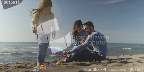 Image of Young family enjoying vecation during autumn