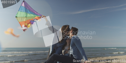 Image of Young family enjoying vecation during autumn