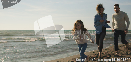 Image of Young family enjoying vecation during autumn