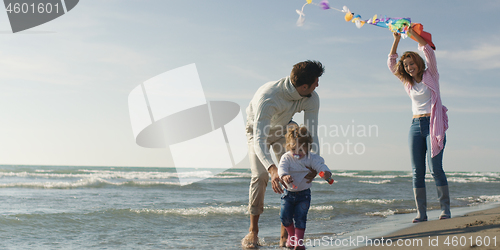 Image of Young family enjoying vecation during autumn