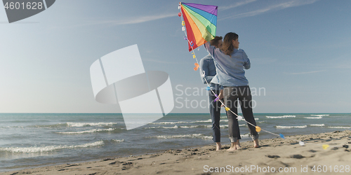 Image of Couple enjoying time together at beach