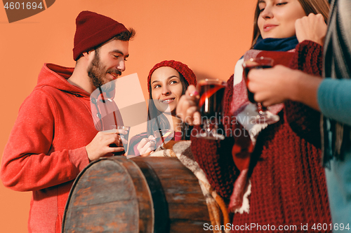 Image of Smiling european men and women during party photoshoot.