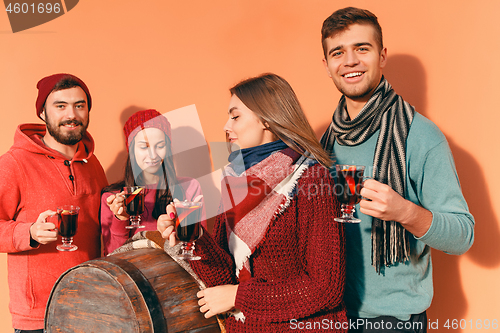 Image of Smiling european men and women during party photoshoot.