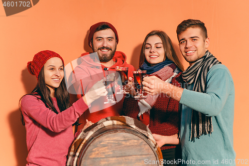 Image of Smiling european men and women during party photoshoot.