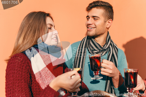 Image of Smiling european men and women during party photoshoot.