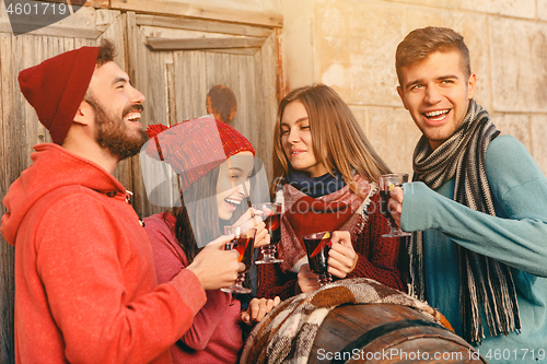 Image of Smiling european men and women during party photoshoot.