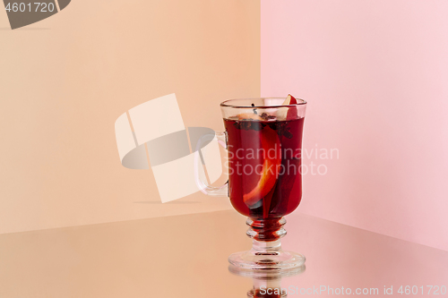 Image of Mulled wine in glass on on the glass table