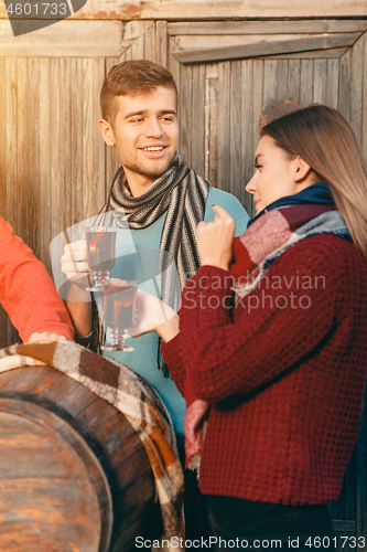 Image of Smiling european men and women during party photoshoot.