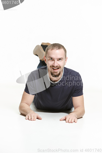 Image of Man lying on floor