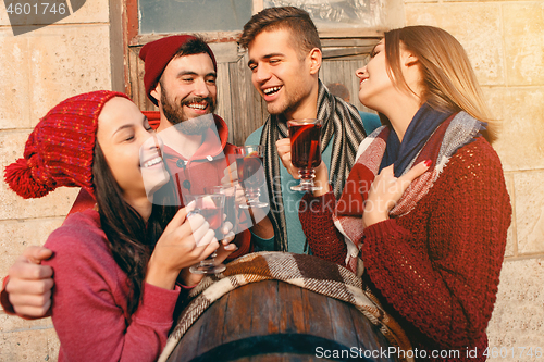 Image of Smiling european men and women during party photoshoot.