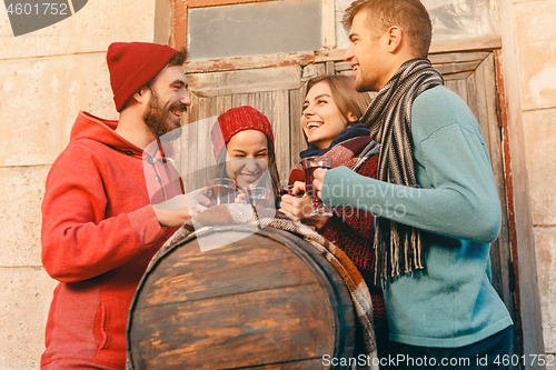 Image of Smiling european men and women during party photoshoot.