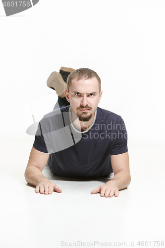 Image of Man lying on floor