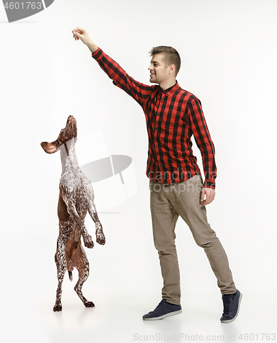 Image of Emotional Portrait of a man and his dog, concept of friendship and care of man and animal