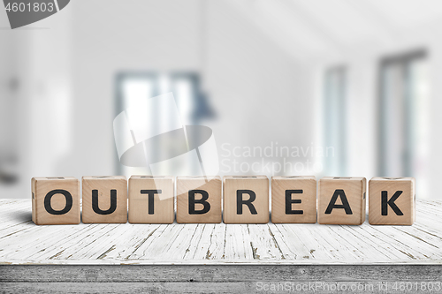 Image of Outbreak message on a desk