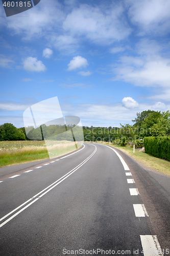 Image of Curvy road in a rural countryside landscape