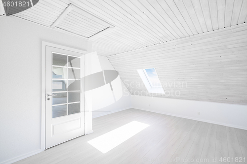 Image of Bright room with the sun shining through a small window