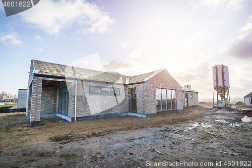 Image of New brick house at a construction site