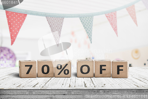 Image of Special price 70 percent off promotion sign