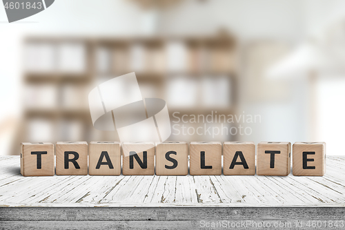 Image of Translate message on a desk in a bright living room