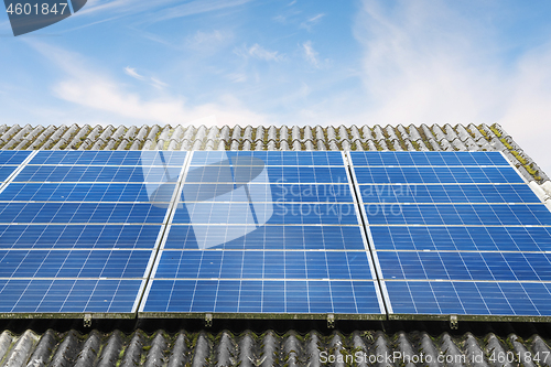 Image of Solar panels in blue color on a roof