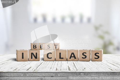 Image of Best in class sign on a wooden table